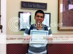 Vinicius with his diploma